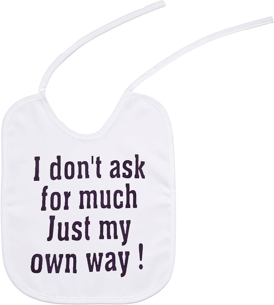 Small white tie baby bib with a screen printed design saying "i don't ask for much just my own way" in purple 