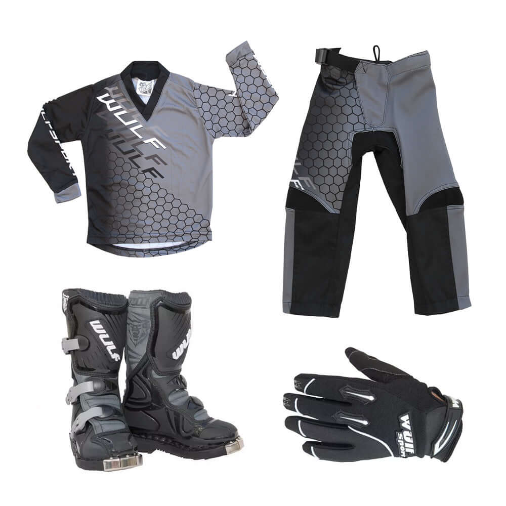 Motorcycle racing gear set including jersey, pants, boots, and gloves on a white background